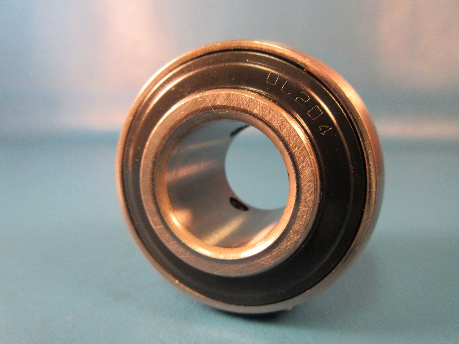 TRITAN UC204-20MM, 20 mm Bore, 47 mm OD, 17 mm Outer Ring Wide, Set Screws