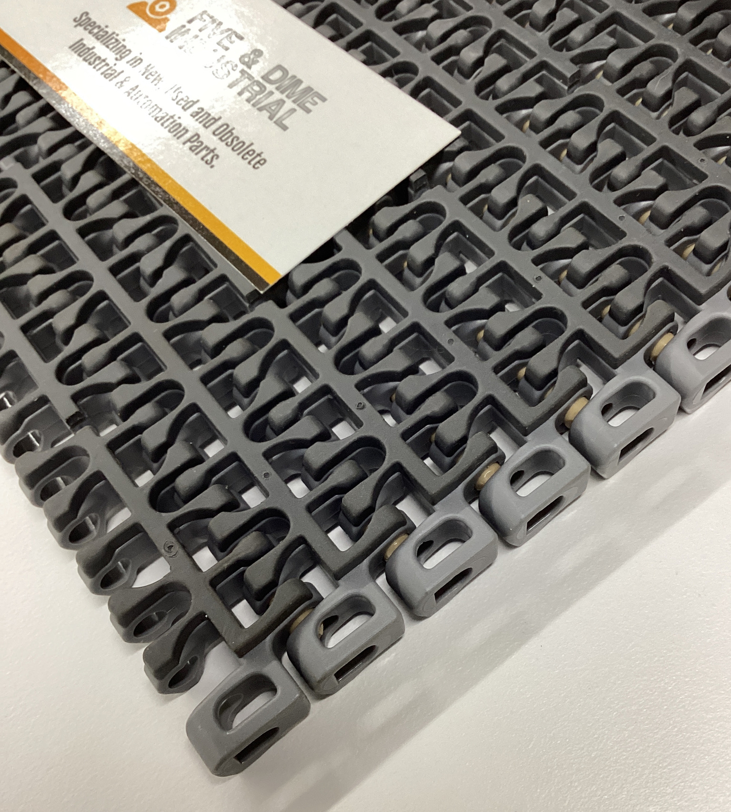 Intralox 23426 Grey 1100 Ser. Flush Grid Friction Top 8″ X 10′ 200 Rows