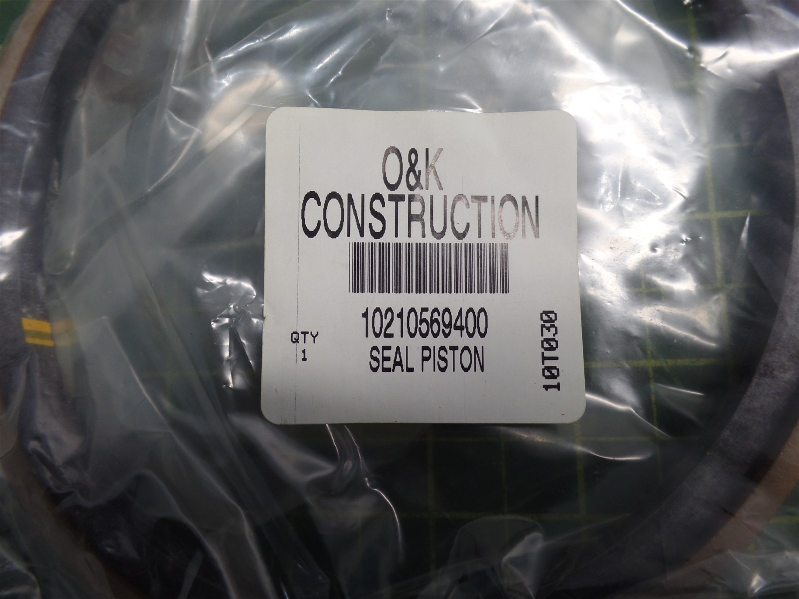 GENUINE TROJAN O&K 10210569400 PISTON SEAL ASSEMBLY, TEREX 10-210569400, N.O.S