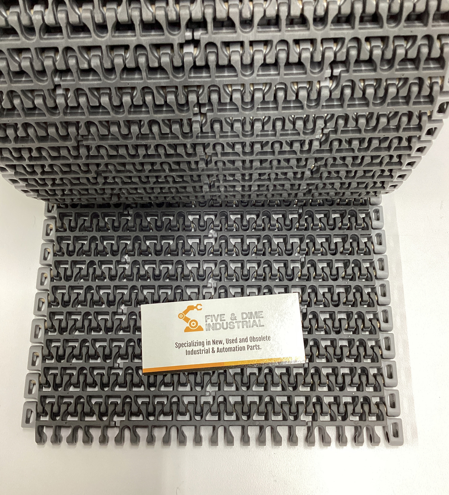 Intralox 23426 Grey 1100 Ser. Flush Grid Friction Top 8″ X 10′ 200 Rows