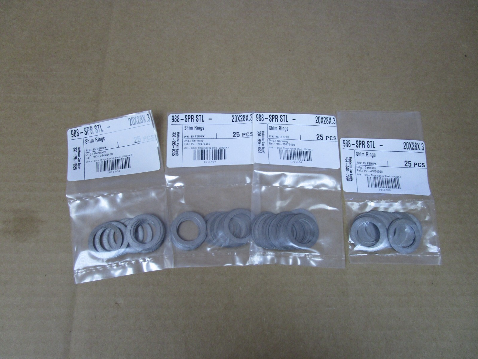 NEW LOT OF 100 McMASTER CARR SHIM RINGS 988-SPR STL-20X28X.3