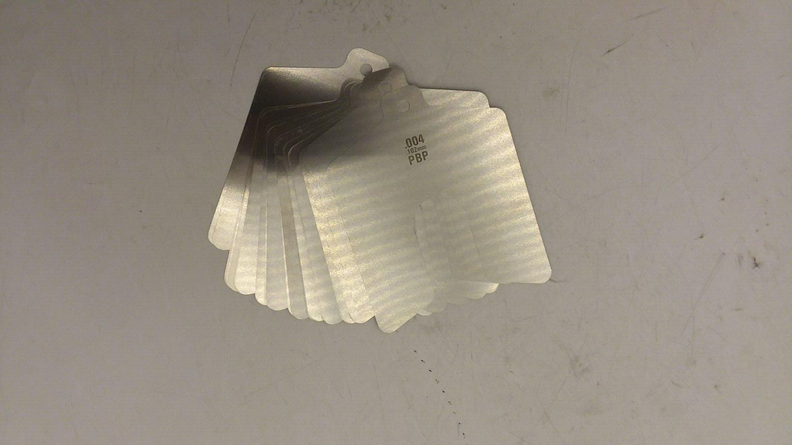 PRECISION BRAND 42320 STAINLESS STEEL SLOTTED SHIM 3″X3″ x 0.004″ THICK NIB