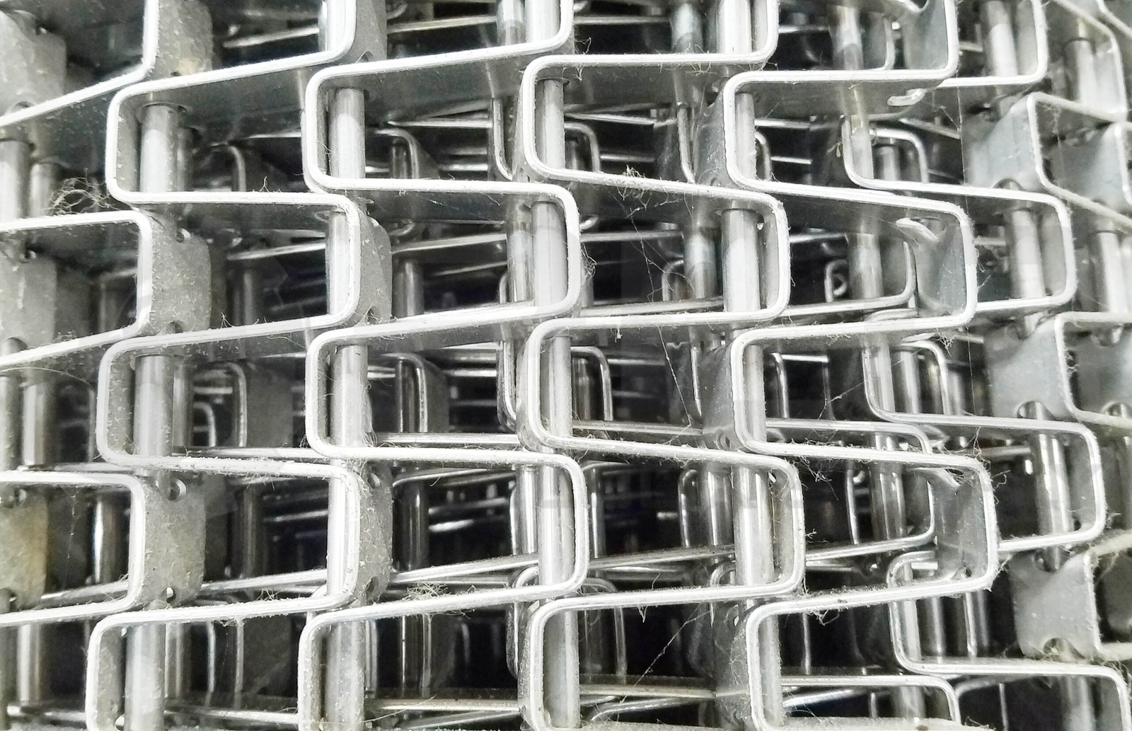 NEW STAINLESS STEEL CONVEYOR BELT 17.75in WIDTH x 0.5in THICK APPROX. 30ft ROLL