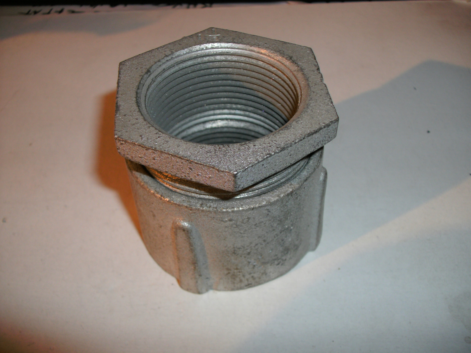 Rigid Three-Piece Erickson Coupling 1-1/4″ Threaded Malleable