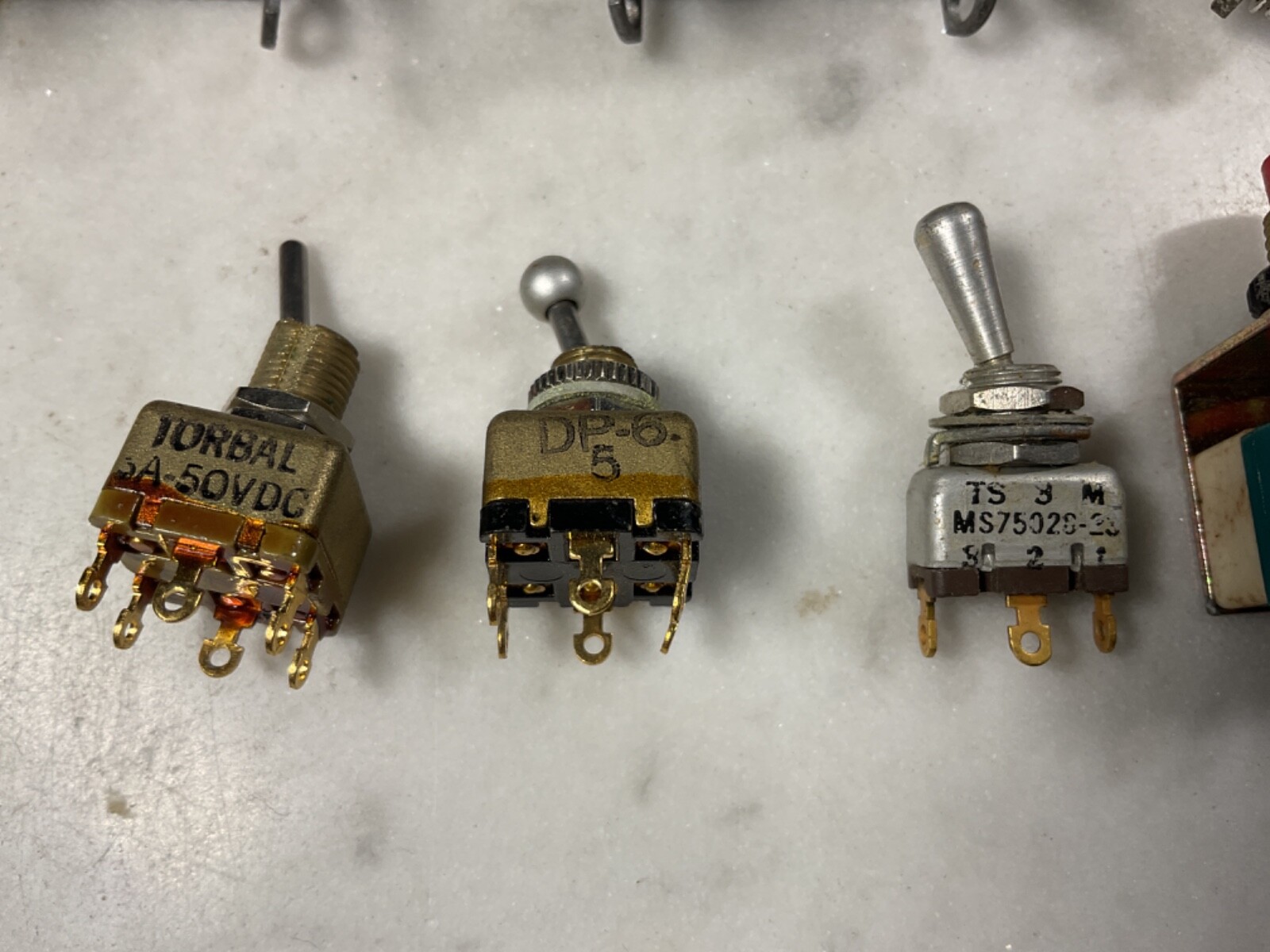 12 Toggle Switches and Push Buttons
