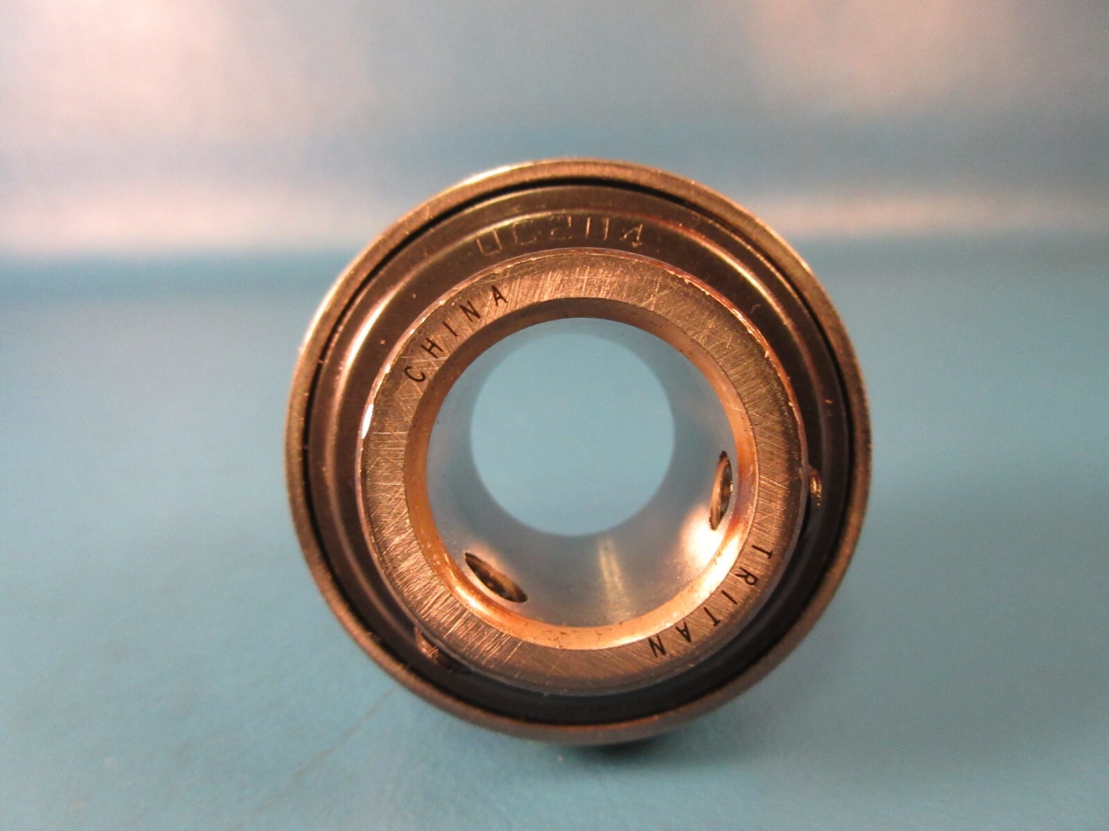 TRITAN UC204-20MM, 20 mm Bore, 47 mm OD, 17 mm Outer Ring Wide, Set Screws