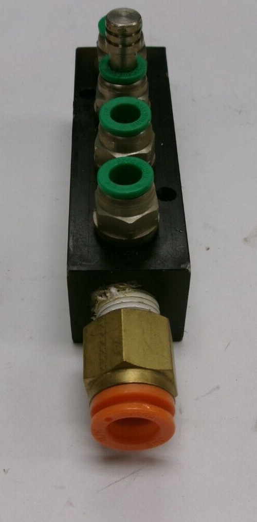 4-Port Manifold w/ (1) SMC Spore 3/8, (4) Numatics 1/4 Fittings included #T1111S
