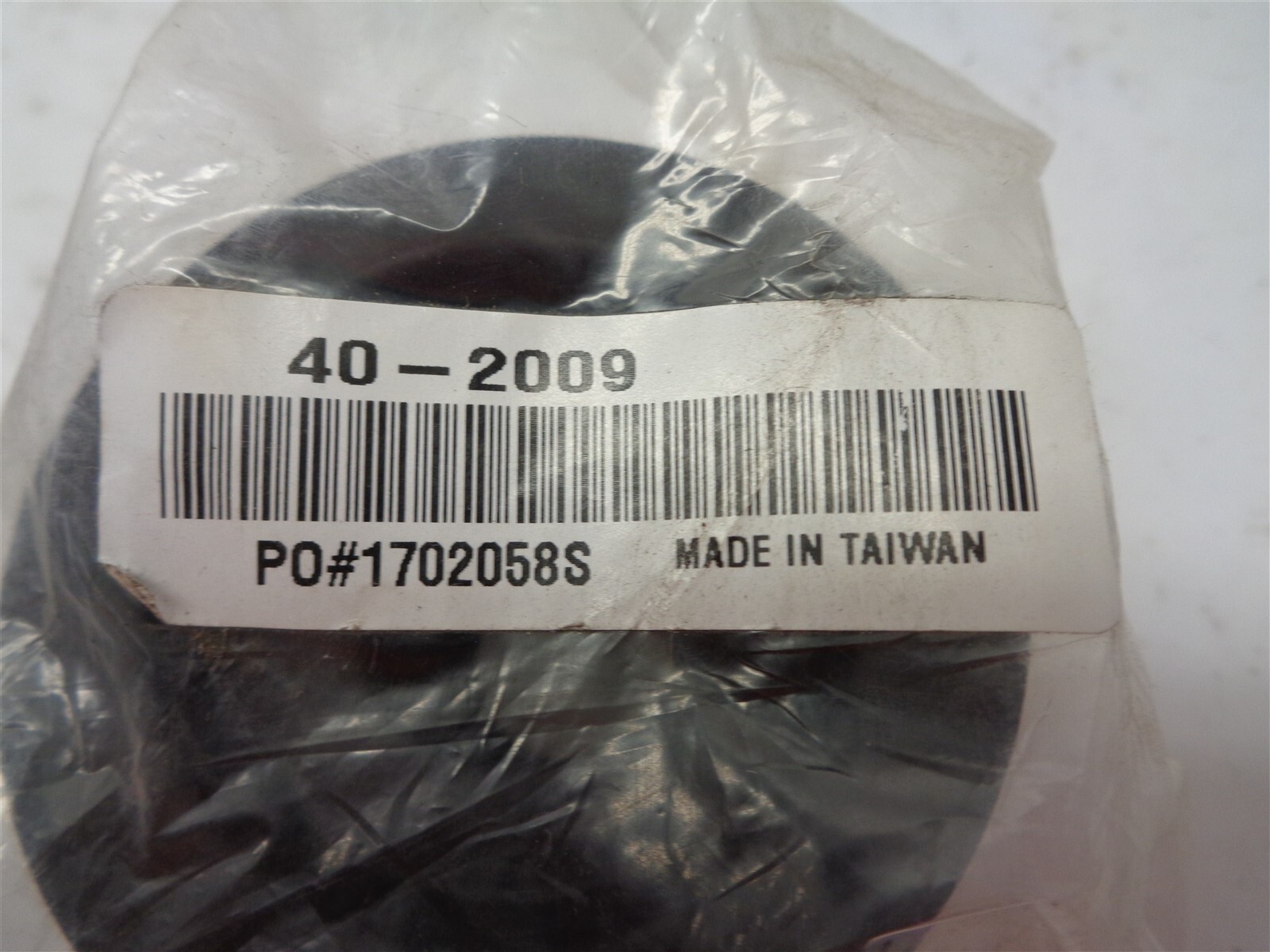 Part Number 40-2009 Black Rubber Wheel 2-9/16″ x 1-9/16″