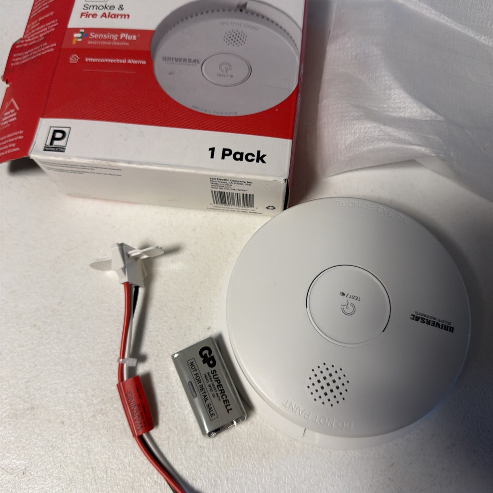 USI Hardwired and 1-Year Battery Backup Smoke Detector with Photoelectric Sensor