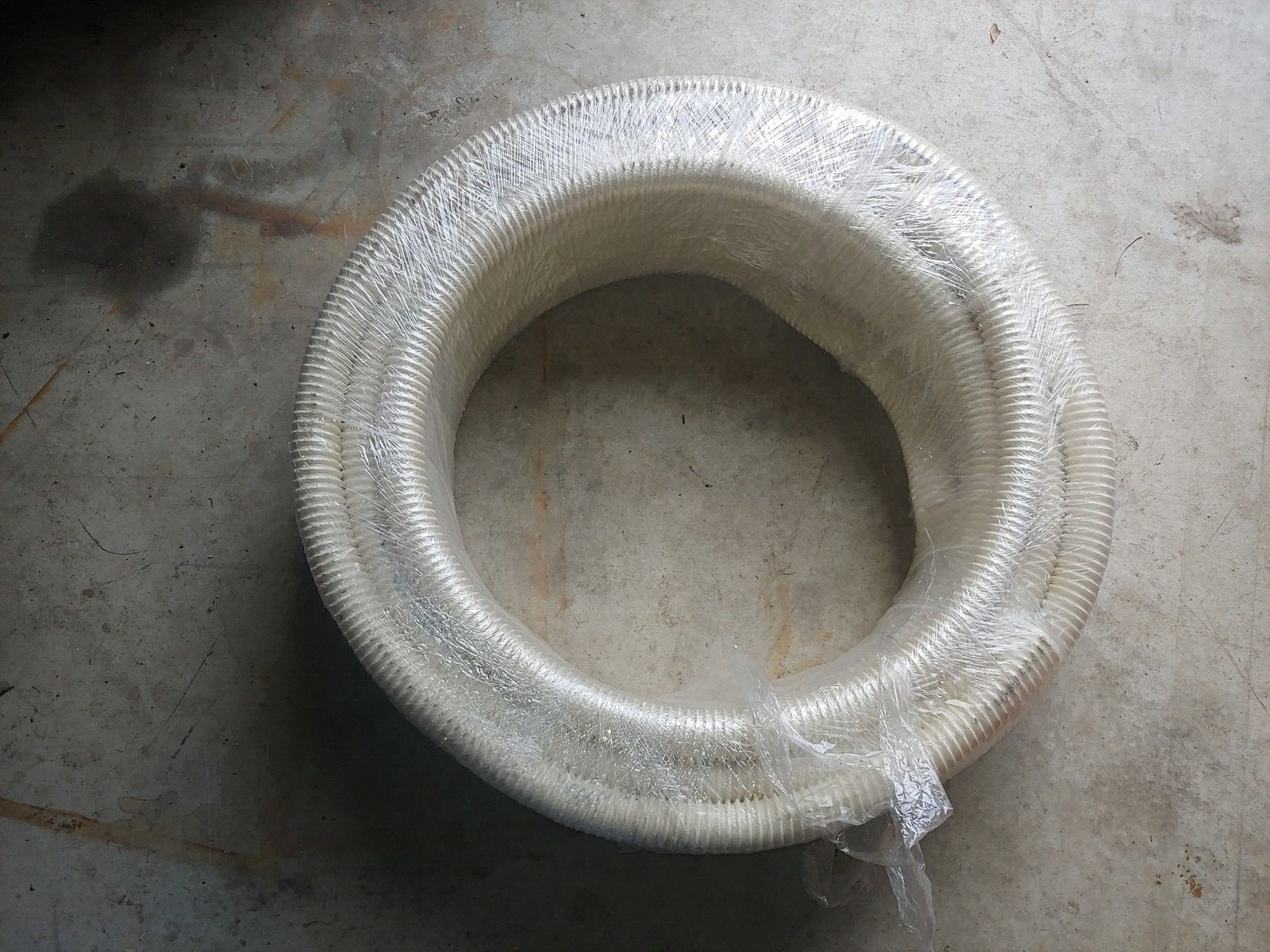 100′ 1-1/4″ Corrugated PVC Transfer Hose made by Abbott Rubber Hose (44084-BPR1)