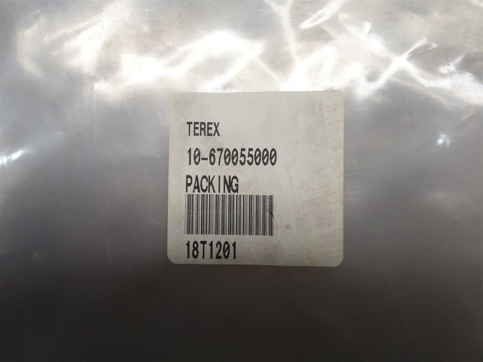 GENUINE TROJAN O&K 10670055000 PACKING, TEREX 10-670055000, NOS