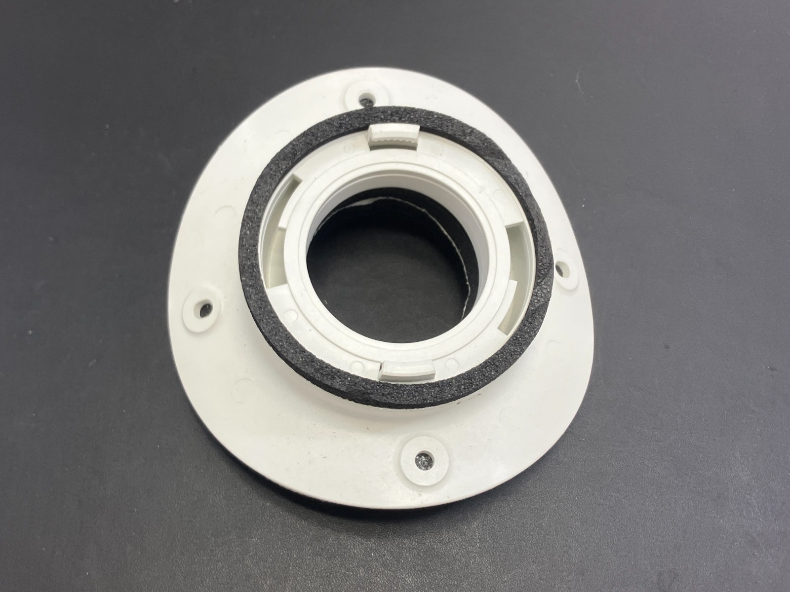Unico System Saddle Style white round supply outlet for a high-velocity HVAC