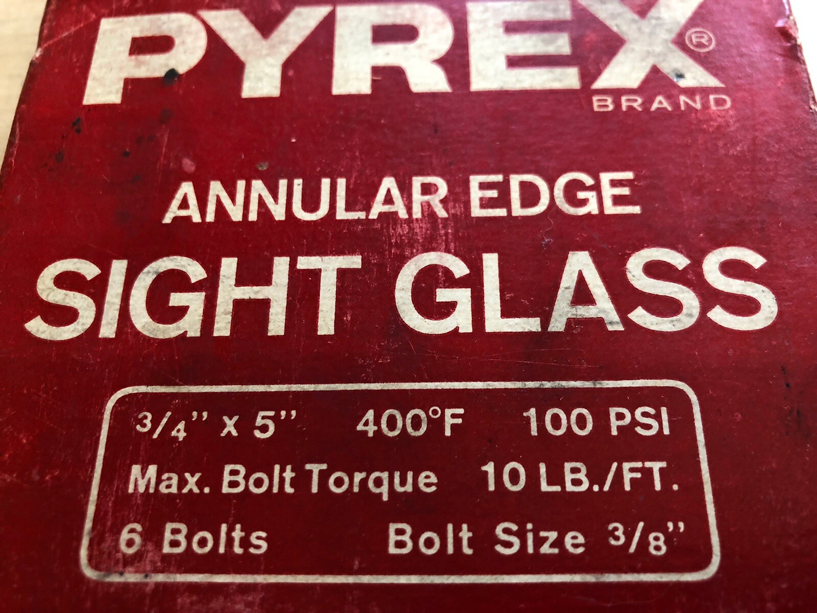 PYREX CORNING SIGHT GLASS ANNULAR EDGE 3/4” X 5” ROUND 400 DEG 100 PSI UNUSED