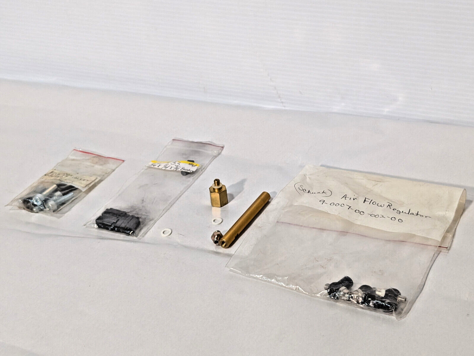 Lot of Small Mechanical Parts, Motor Brushes, Schunck Air Flow Regulator, More