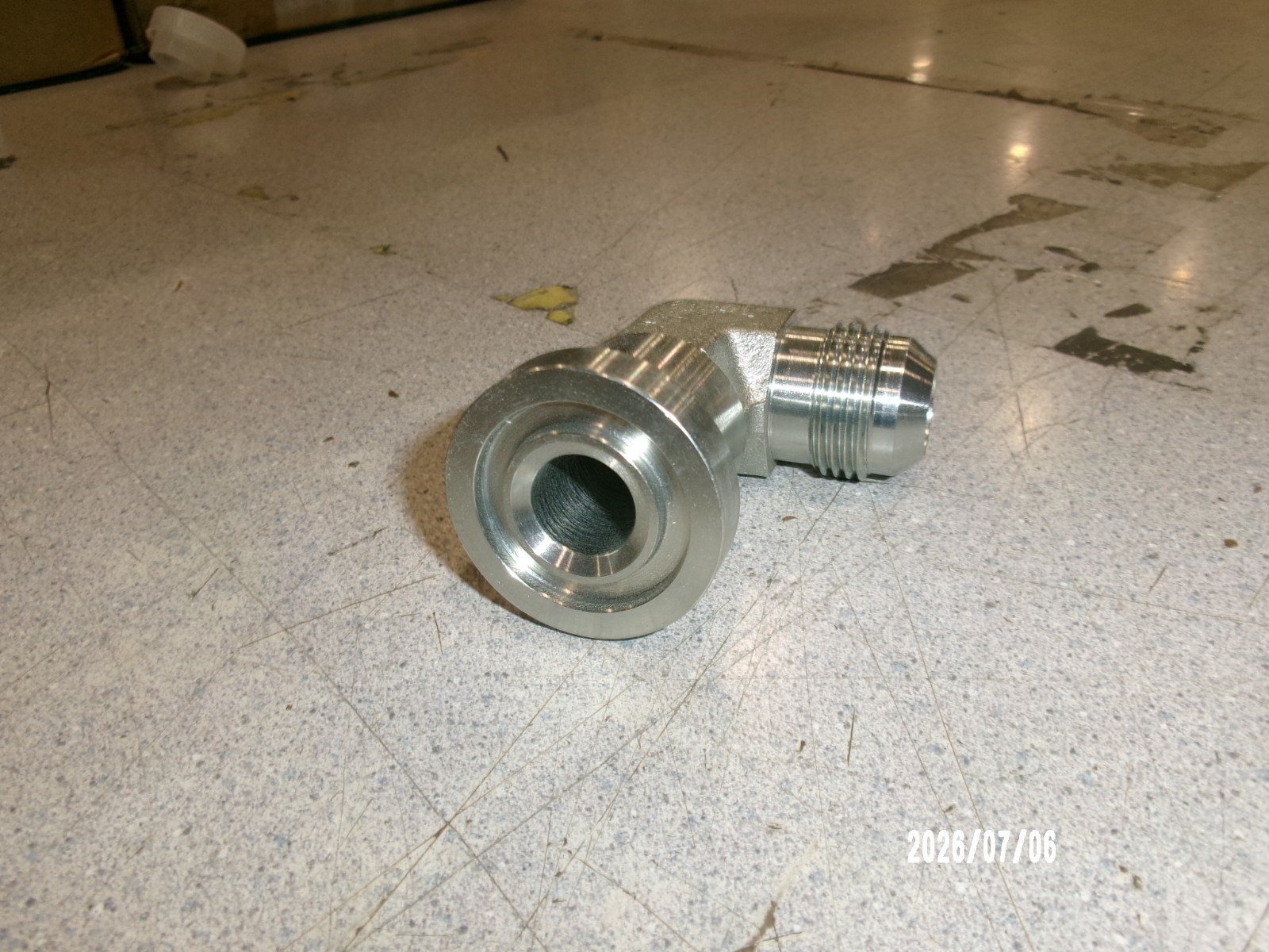 690-12-12 ADAPTER 90E 12JM TO 12C62 SPT FLG HEAD STL