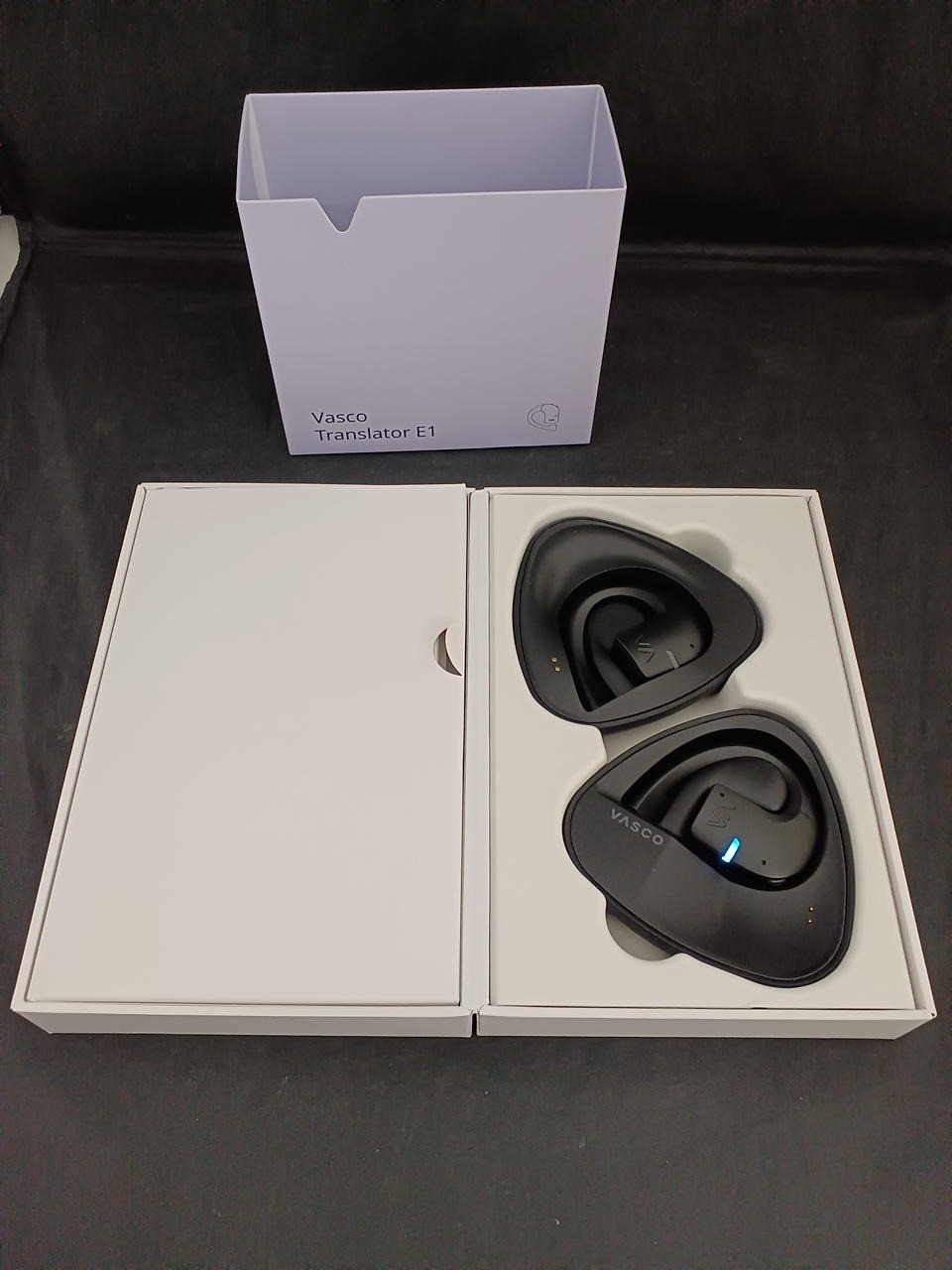 Used Vasco E1 earbuds Translator 50 languages with two earphones right side