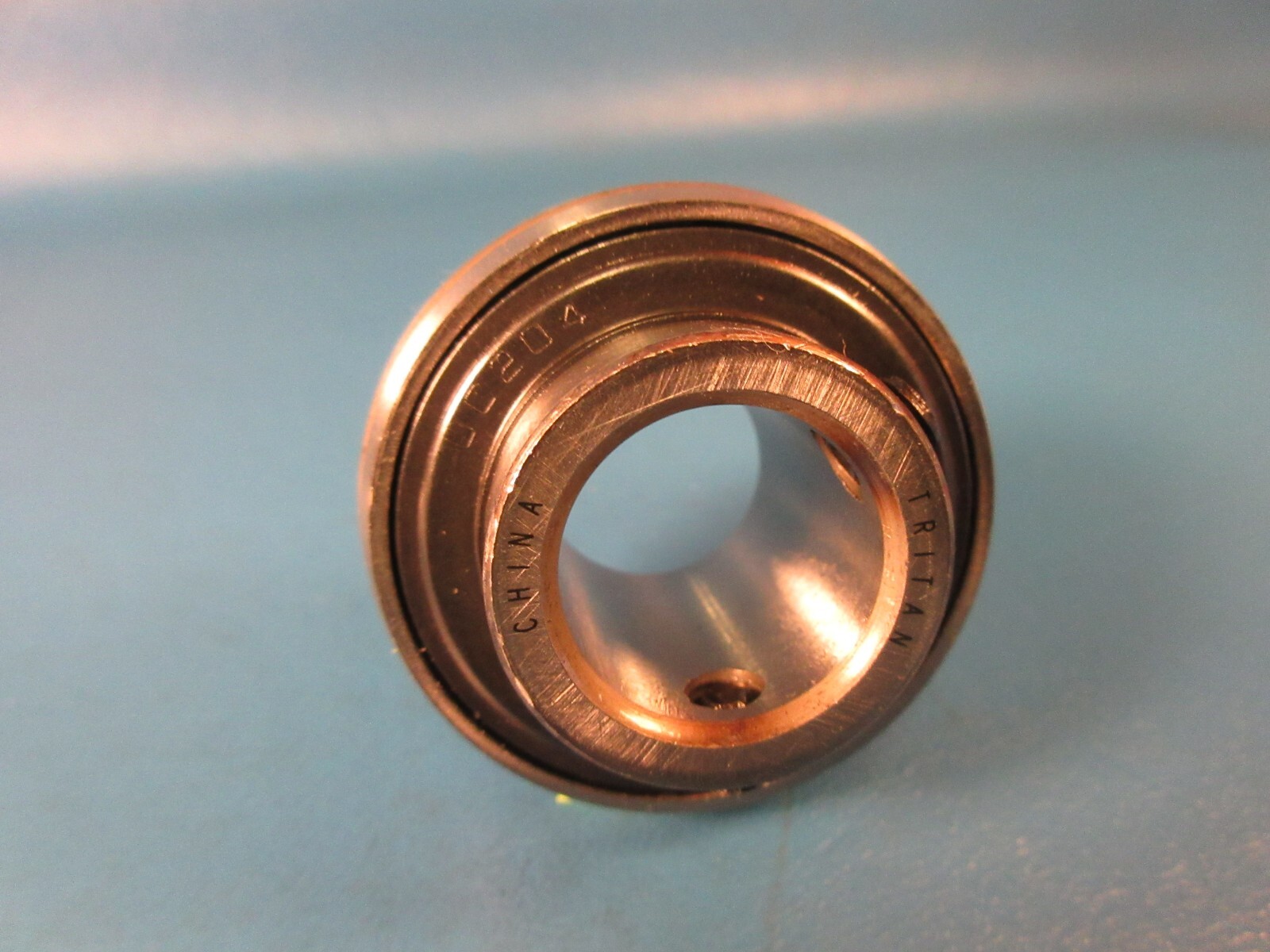 TRITAN UC204-20MM, 20 mm Bore, 47 mm OD, 17 mm Outer Ring Wide, Set Screws