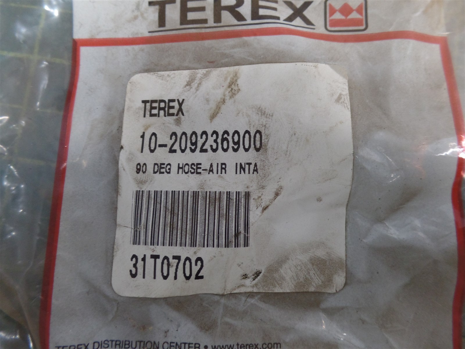 GENUINE TROJAN O&K 10209236900, 90° INTAKE HOSE,TEREX 10-209236900, NOS