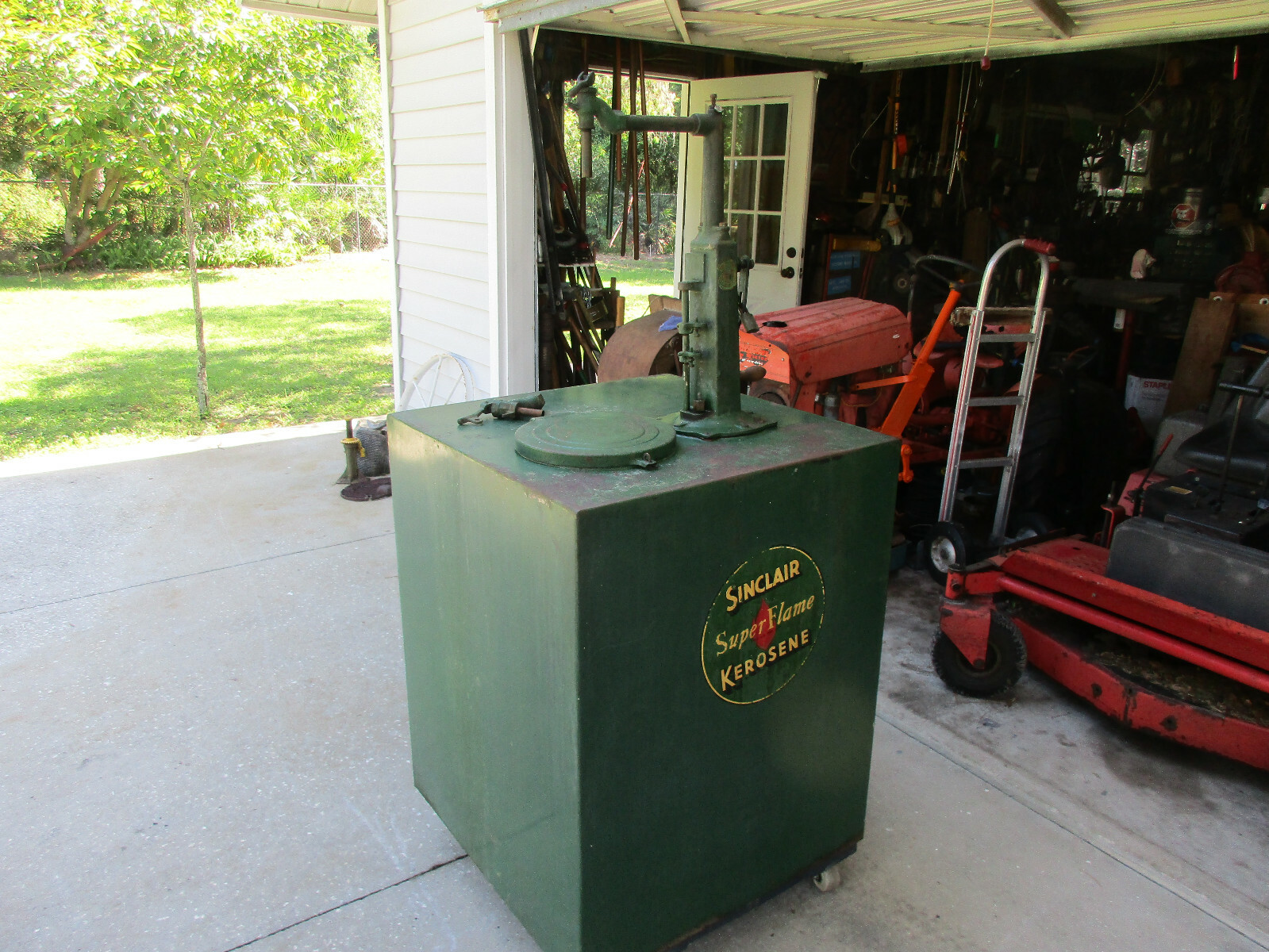 Sinclair kerosene oil tank with hand metering pump by Erie #2240, 120 gallon