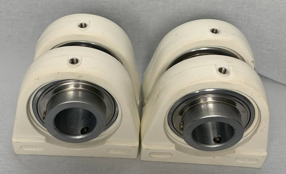 Set of (4) NEW IPTCI Bearings Thermoplastic Housing 1-1/4″ CUC 207-20
